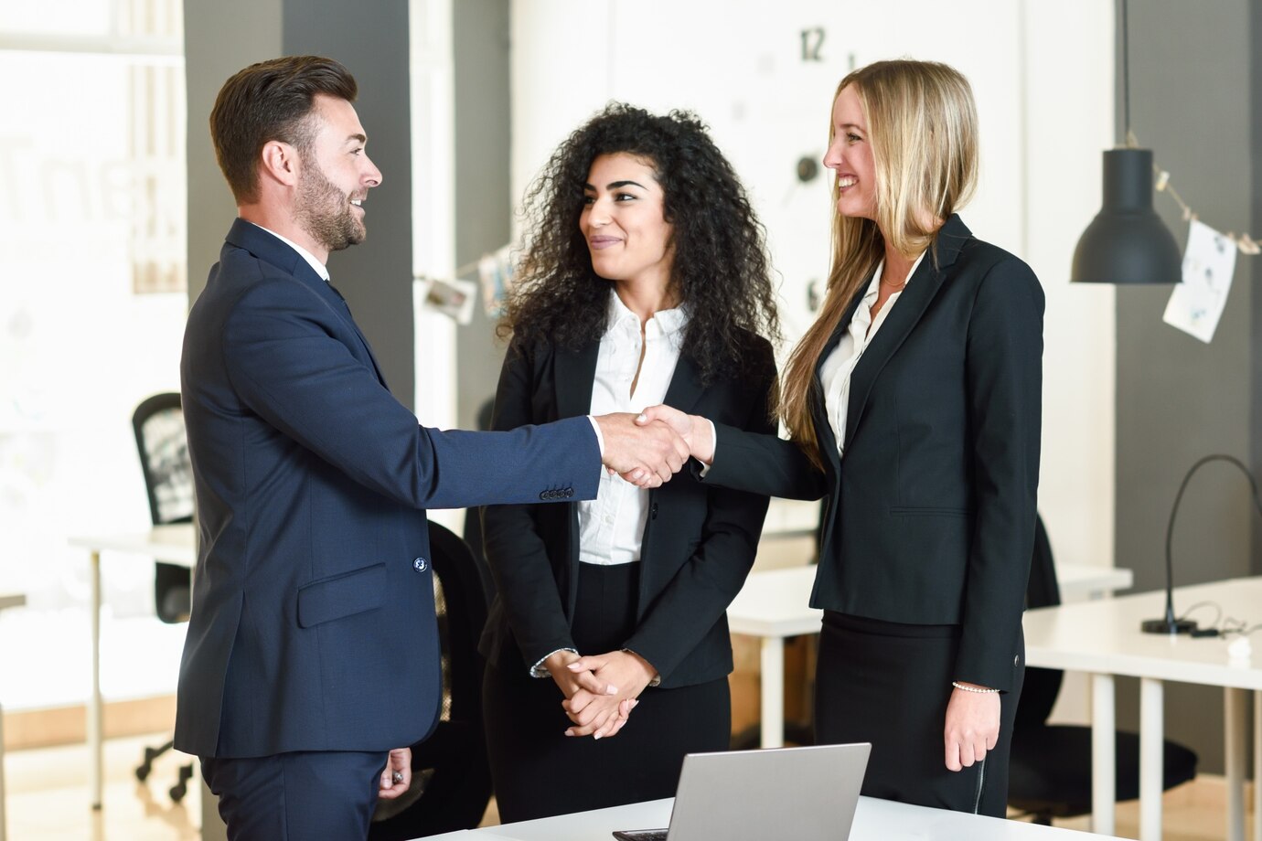 man-woman-shaking-hands